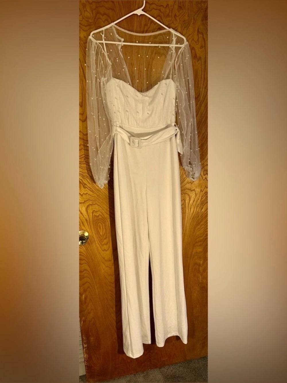Lulu’s white pant suit with sheer, beaded top. 
Size M